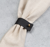 NAMUOS black leather and brass napkin rings at maeree